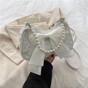 White ruched fabric bag with large organza bow and pearl chain handle for summer