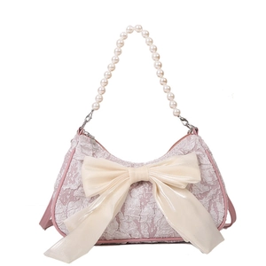 Pink lace handbag with large silk bow and pearl beaded handle for women