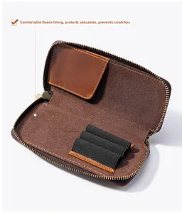 Detail of soft velvet lining and elastic bands inside the leather pen organizer bag