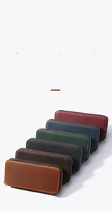 Detail view showing color palette of vintage crazy horse leather zipper pen cases