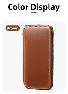 Close-up of brown crazy horse leather pouch with zipper closure and fine stitching