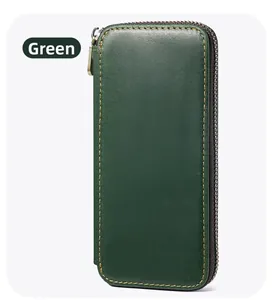 Detailed view of dark green crazy horse leather pencil case with metal zipper and stitching