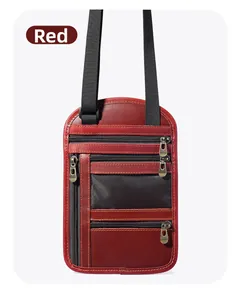 Close-up of red leather neck pouch showing multiple RFID blocking zipper pockets