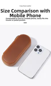 Brown crazy horse leather zipper pen case compared with a smartphone for size reference
