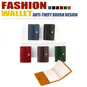 Detailed view of RFID blocking leather card holders in various colors with metal snaps