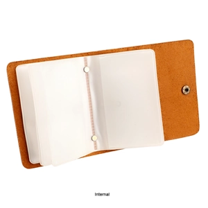 Macro shot of brown leather credit card holder showing multi-slot internal pockets