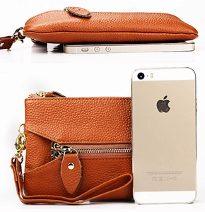 Brown litchi grain leather wristlet wallet with gold zipper compared to iPhone size