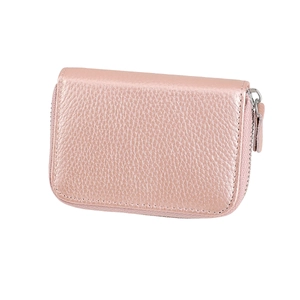 Close-up of rose gold pebbled leather card holder with secure silver zipper closure