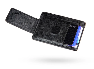 Detail of slim black lychee leather RFID wallet with magnetic closure and card slots