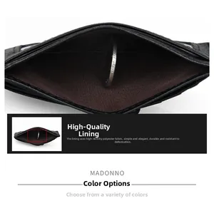Detailed view of the RFID-blocking card holder with lychee pattern and silver coin detail