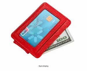 Detail of red leather RFID slim card holder with ID window and side pocket for banknotes