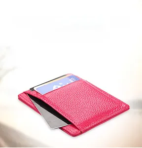 Macro view of rose red leather card holder featuring ultra-thin multi-slot RFID design