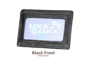 Detail of RFID black lychee leather card holder with clear ID window and fine stitching