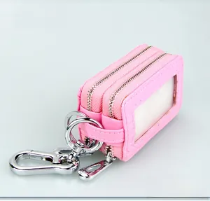 Pink lychee texture leather car key bag with double zippers and clear ID window