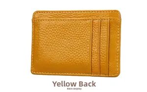 Detail view of yellow litchi pattern leather RFID wallet with three vertical card slots