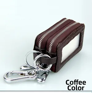 Detail view of coffee brown lychee grain leather car key pouch with double zipper