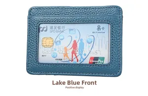 Close-up of lake blue pebble leather card holder with a large clear ID window and neat stitching