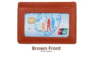 Detailed close-up of brown litchi grain leather card holder with a clear ID window