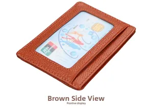 Macro view of brown lychee leather RFID wallet showing transparent ID window and card slot