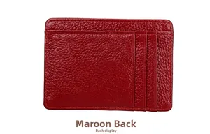 Detail of burgundy leather RFID wallet back with three card slots and lychee texture