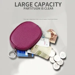 Magenta genuine leather mini coin purse with three compartments and metal keyring