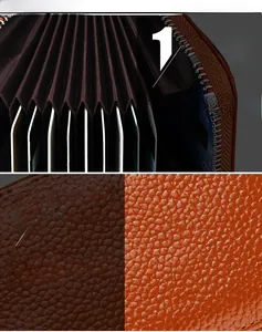 Detailed macro view of orange lychee texture leather and internal accordion card slots
