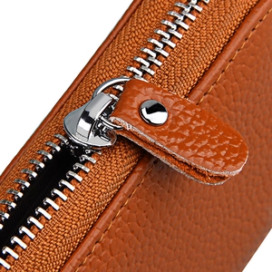 Brown lychee leather multipurpose wallet featuring secure silver metal zipper and rivet detail
