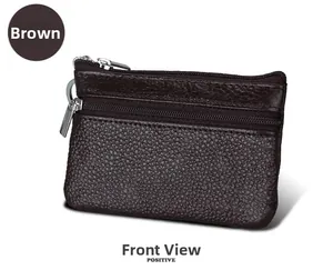 Close-up of brown pebble leather coin purse with dual zippers and metal keychain