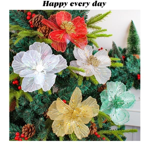 Glitter mesh Christmas flowers decoration with pine cones on green tree branches