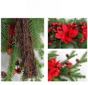 Detail of Christmas poinsettia wreath with red berries, pine cones and wooden base