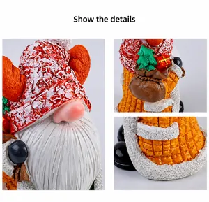 Detail showing resin gnome figurine with knitted texture and Christmas gift bag