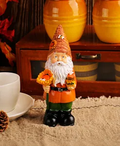 Detailed view of handcrafted garden gnome figurine holding sunflower and honey pot decor