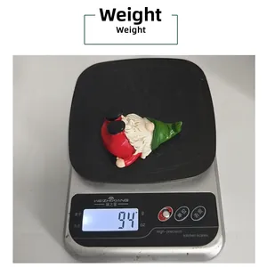 Detailed view of a 94g weighted Christmas gnome in an upside-down handstand pose