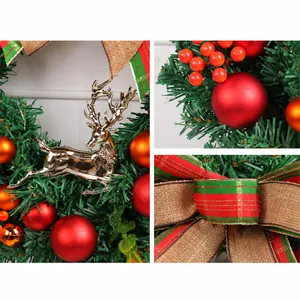 Close-up of golden reindeer pendant and striped bow on Christmas wreath detail