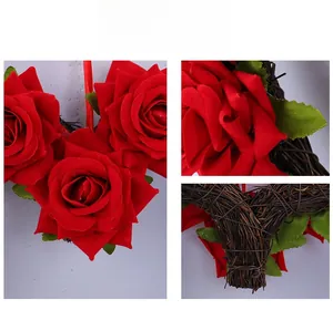 Detail of red silk roses and green leaves on a natural brown wicker wreath base