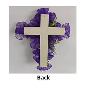 Rear view of Easter wooden cross wreath with purple mesh and green artificial leaves