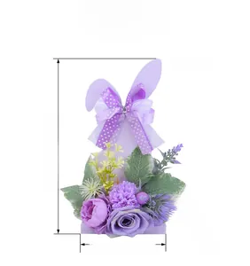Easter bunny figurine featuring purple faux flowers and ribbon with dimension markings