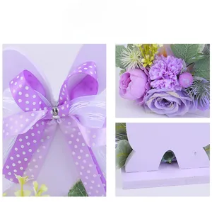 Detailed close-up of purple silk bows and faux roses on Easter desktop ornament