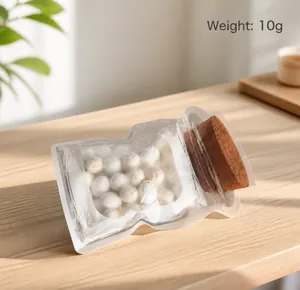 Detailed view of spotted foam Easter eggs in a bottle-shaped bag on a digital scale