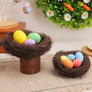 Easter decorative vine bird nest with colorful eggs on a wooden stump and rustic tabletop