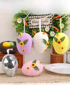 Close-up of Easter hanging eggs with colorful chenille texture and sunflower decorations