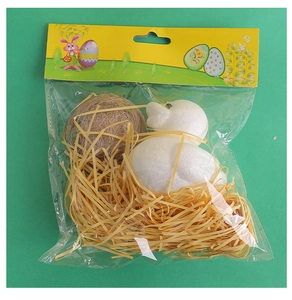Close-up of Easter chick and bird nest set in transparent hanging bag packaging