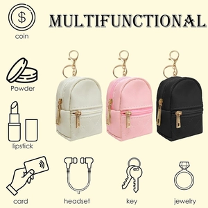 Mini PU leather backpack keychain set in white, pink, and black with diamond stitching