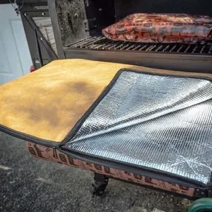 Portable insulated BBQ mat with retro brown leather texture and silver aluminum foil lining