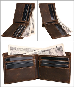 Detail of vintage crazy horse leather wallet showing internal card slots and rfid protection