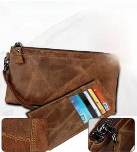 Detail of vintage brown leather long wallet featuring RFID protection and fine stitching