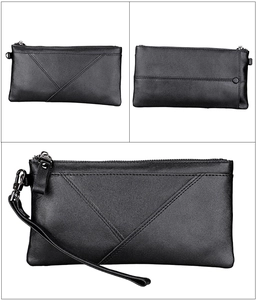 Detail of black crazy horse leather RFID wallet with V-shaped stitching and wrist strap