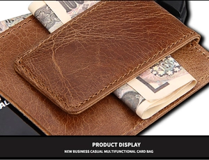 Macro detail of brown crazy horse leather card holder with multiple card slots and money clip