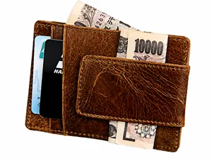 Detailed back view of vintage brown leather card holder with magnetic money clip and card slots