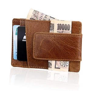 Slim brown crazy horse leather wallet with money clip and card slots on white background